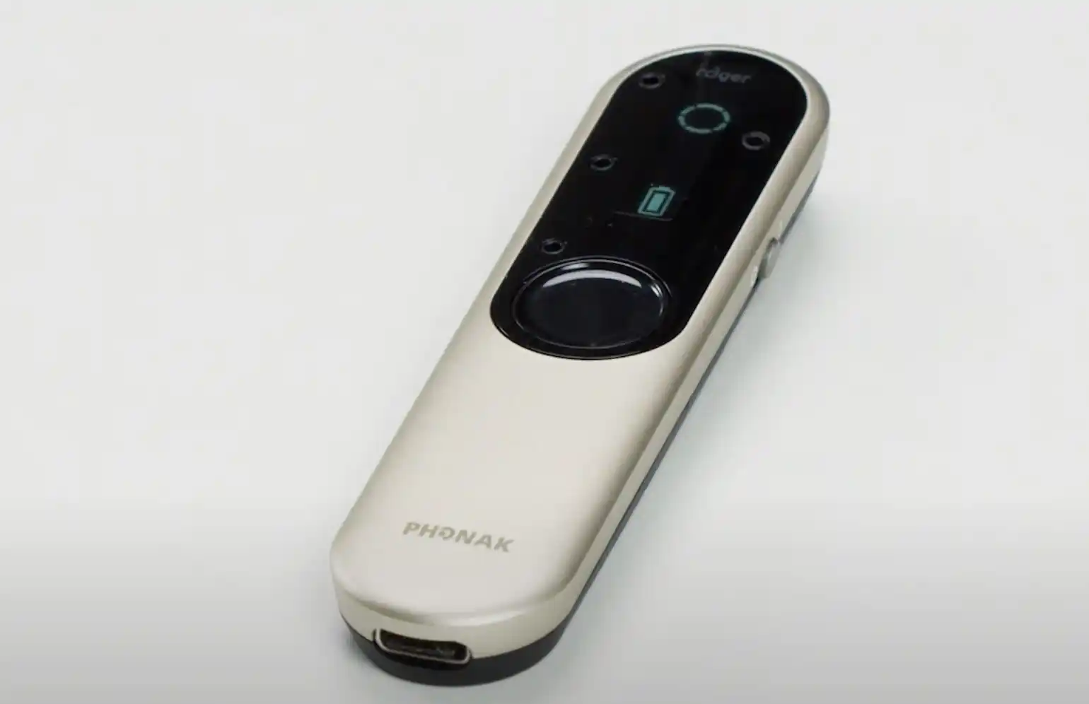 Most major brands of hearing aids and implants include accessories, such as remote microphones and table mics, that facilitate listening in challenging environments, including work settings and meeting rooms. (Shown: Phonak Roger On in Table mode.)