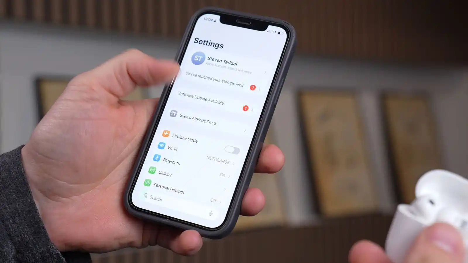 An Apple iPhone showing the hearing aids Adjustments screen.