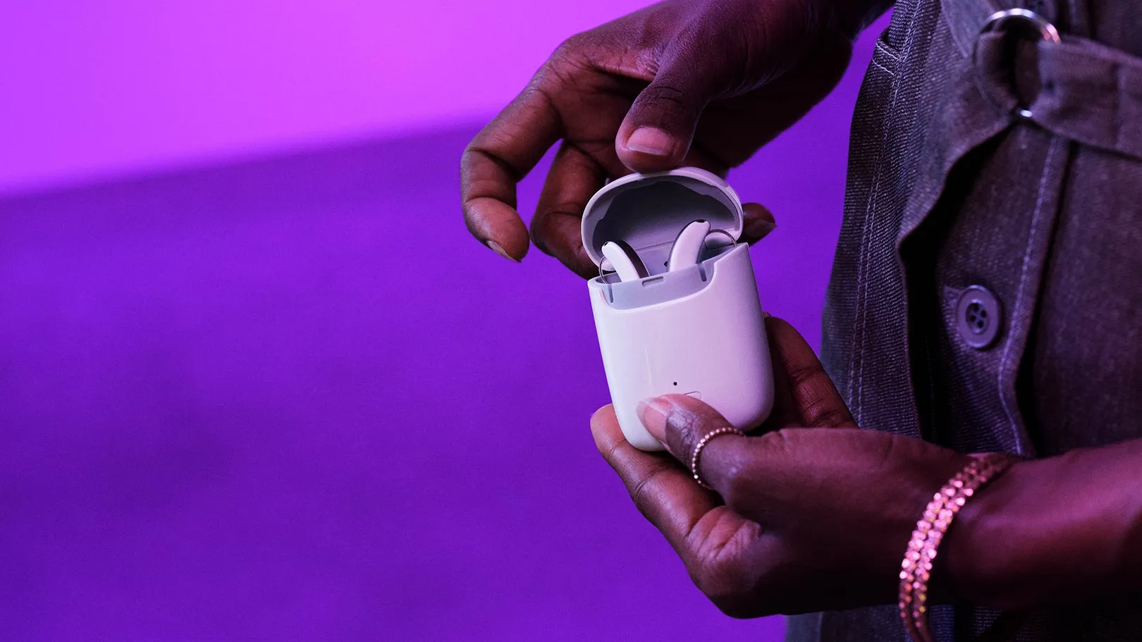 Styletto AX hearing aids in charging case