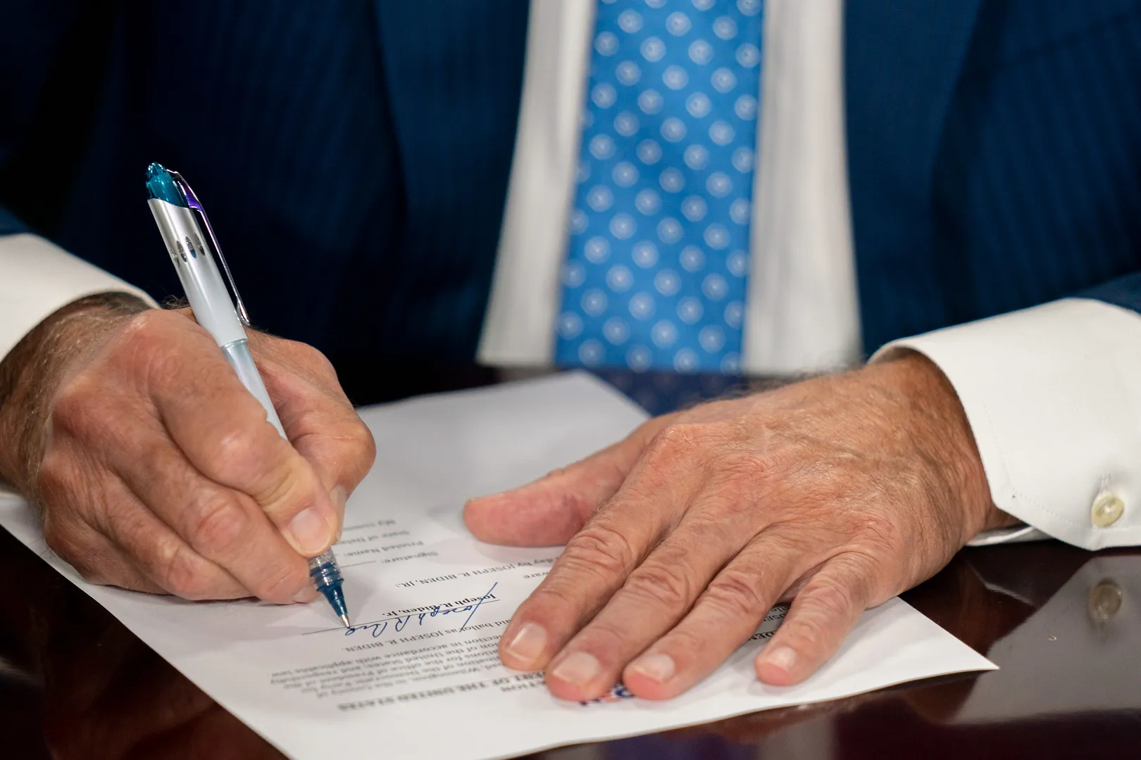 In his first 100 days in office, Biden signed more than 60 executive actions. Photo by Lawrence Jackson.