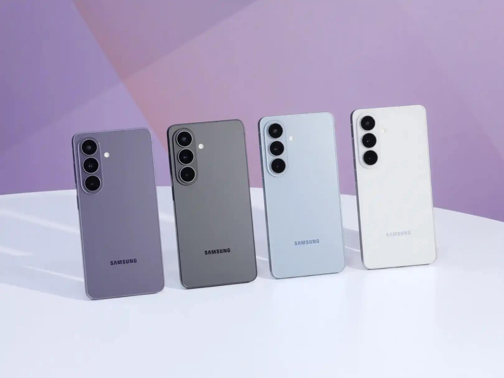 The Samsung Galaxy S26 in its four color variations: cobalt-violet, black, sky-blue, and white.