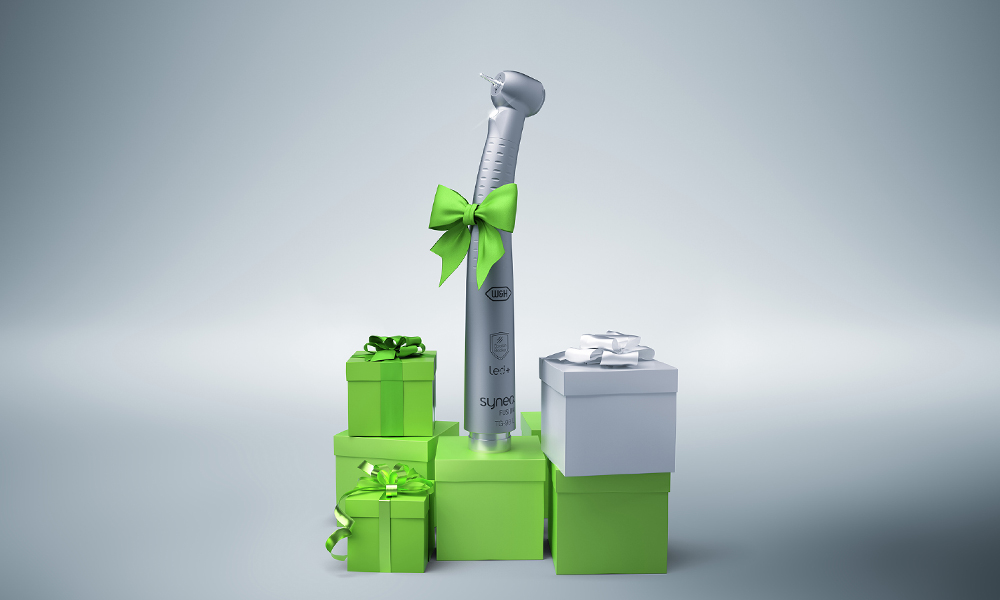 Synea Fusion turbine standing on green presents in front of a grey background. 