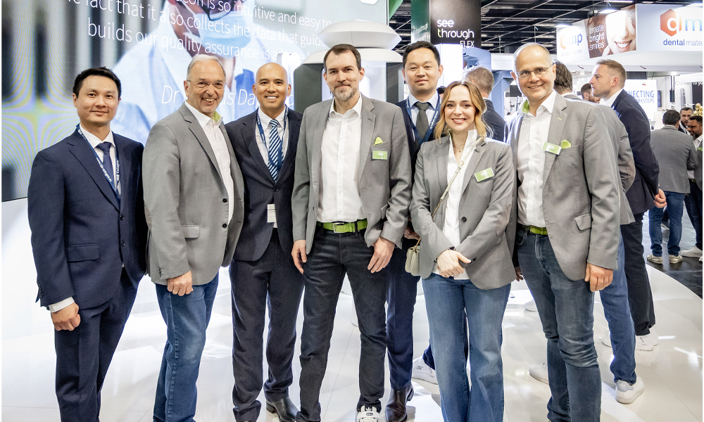 From left to right: Dr. Sen Le, Peter Malata, Jared Huynh, Thomas Lang, Khoa Le, Valeria Ferrari and Klaus Maier at IDS 2025, smiling into the camera.