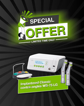 Implantmed Classic with foot control and surgical contra-angle handpieces on green background