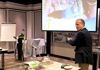 Prof. Stavropoulos shows a video of a patient case, during the introductory lecture of the workshop.