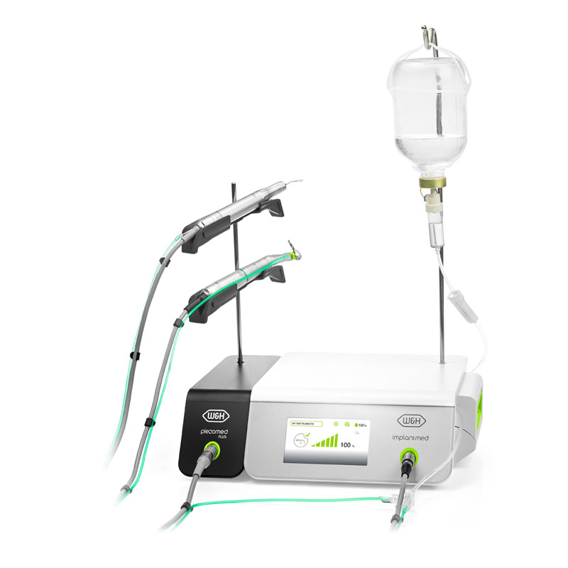 Implantmed con módulo piezomed delante de un fondo blanco.