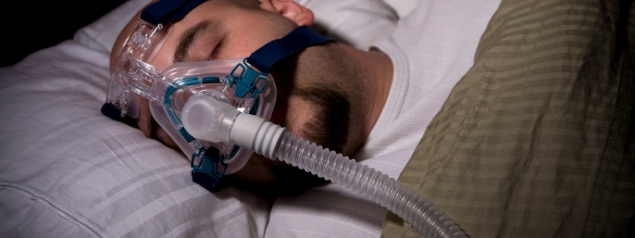 man wearing breathing machine