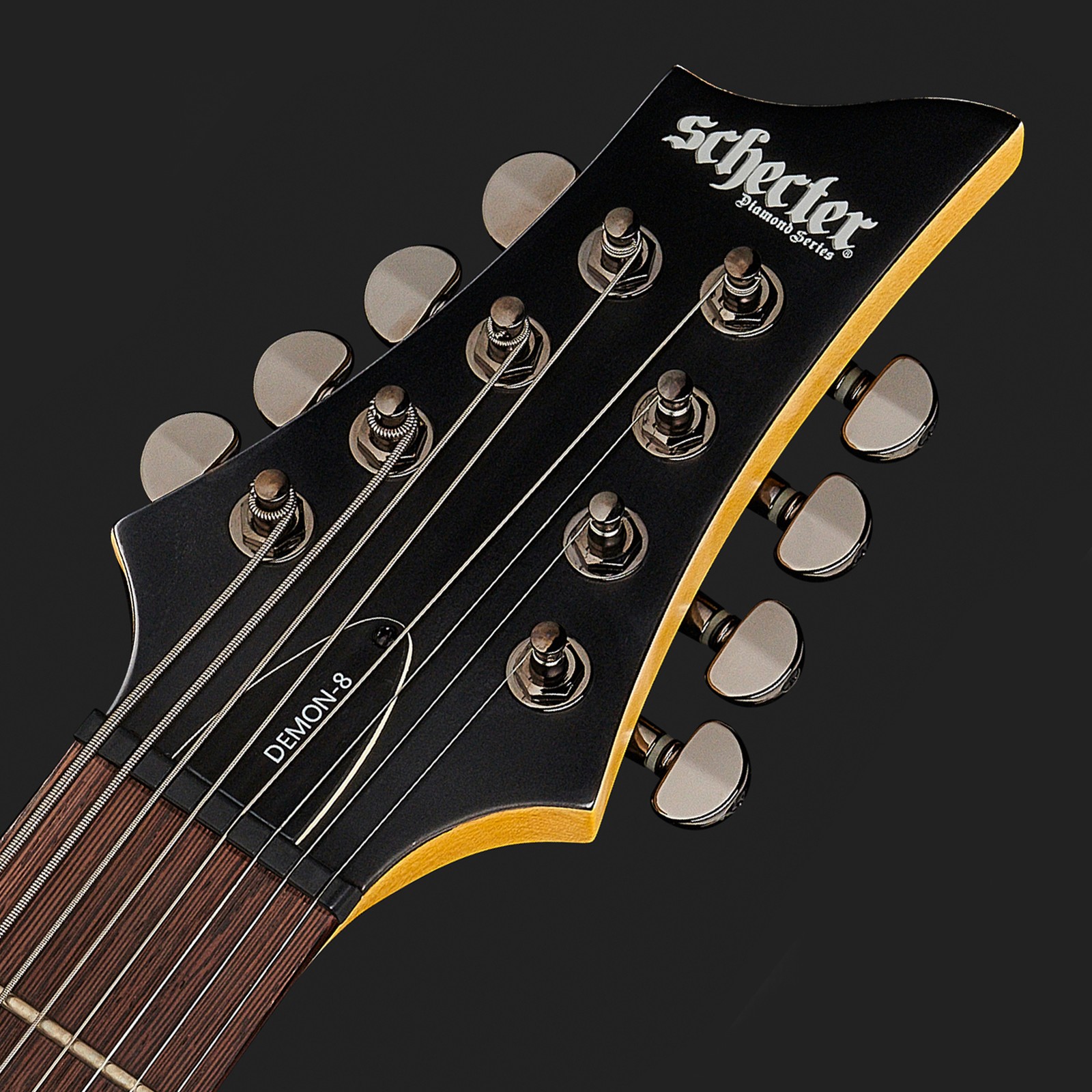 Schecter Demon-8 Aged Black Satin Kopfplatte