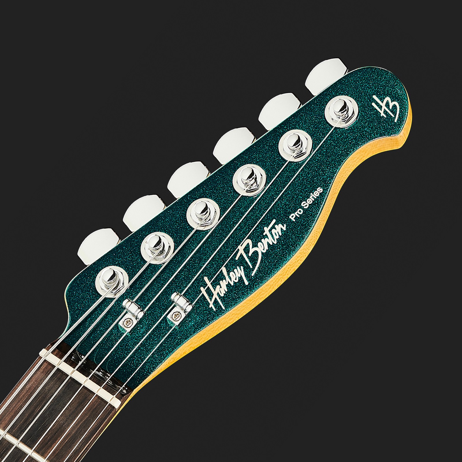green headstock with Harley Benton logo and chrome tuners