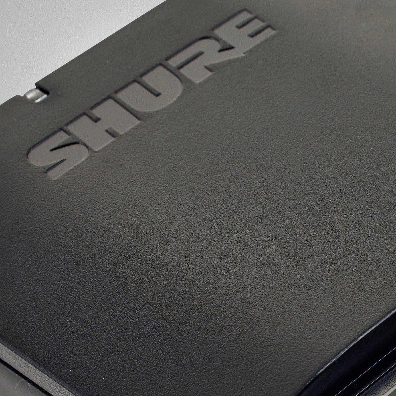 Shure BLX1 H8E, UHF Taschensender, Logo