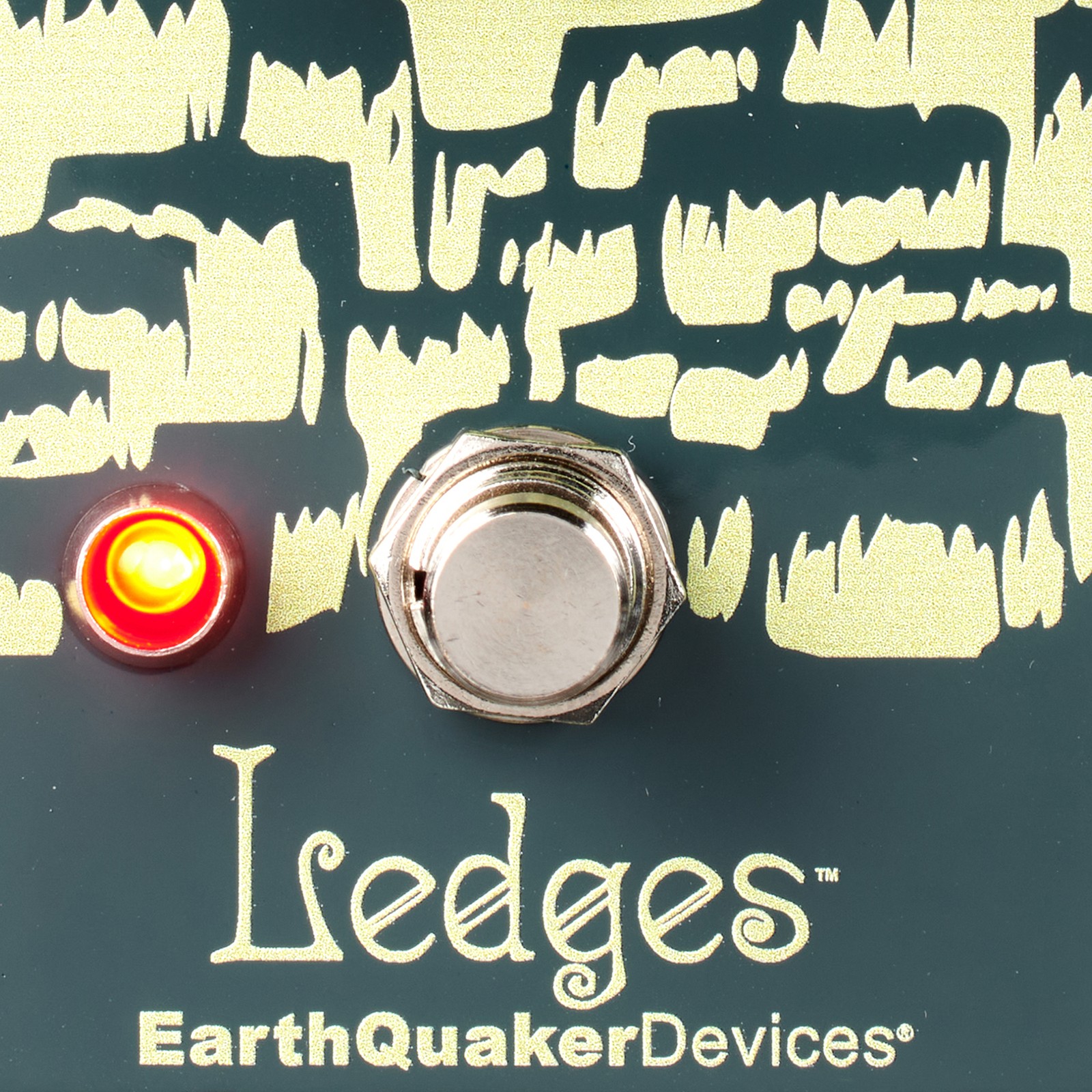 EarthQuaker Devices logo on the effects pedal for electric guitar