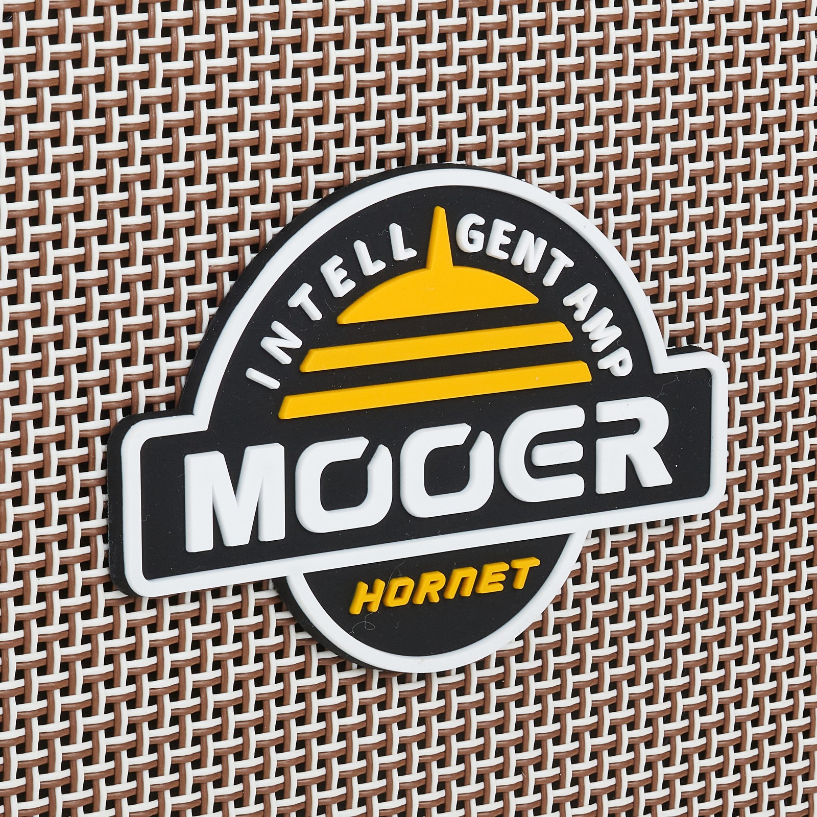 Mooer logo on the front grille of the Mooer Hornet 15i Modeling Amp amplifier