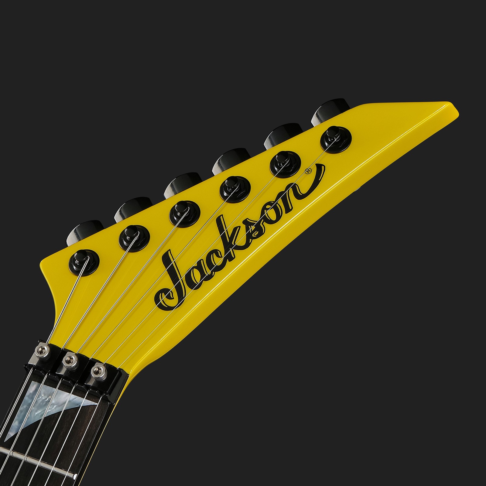 Gelbe Kopfplatte der Jackson American SRS Soloist SL2 FR LI mit Floyd Rose Klemmsattel