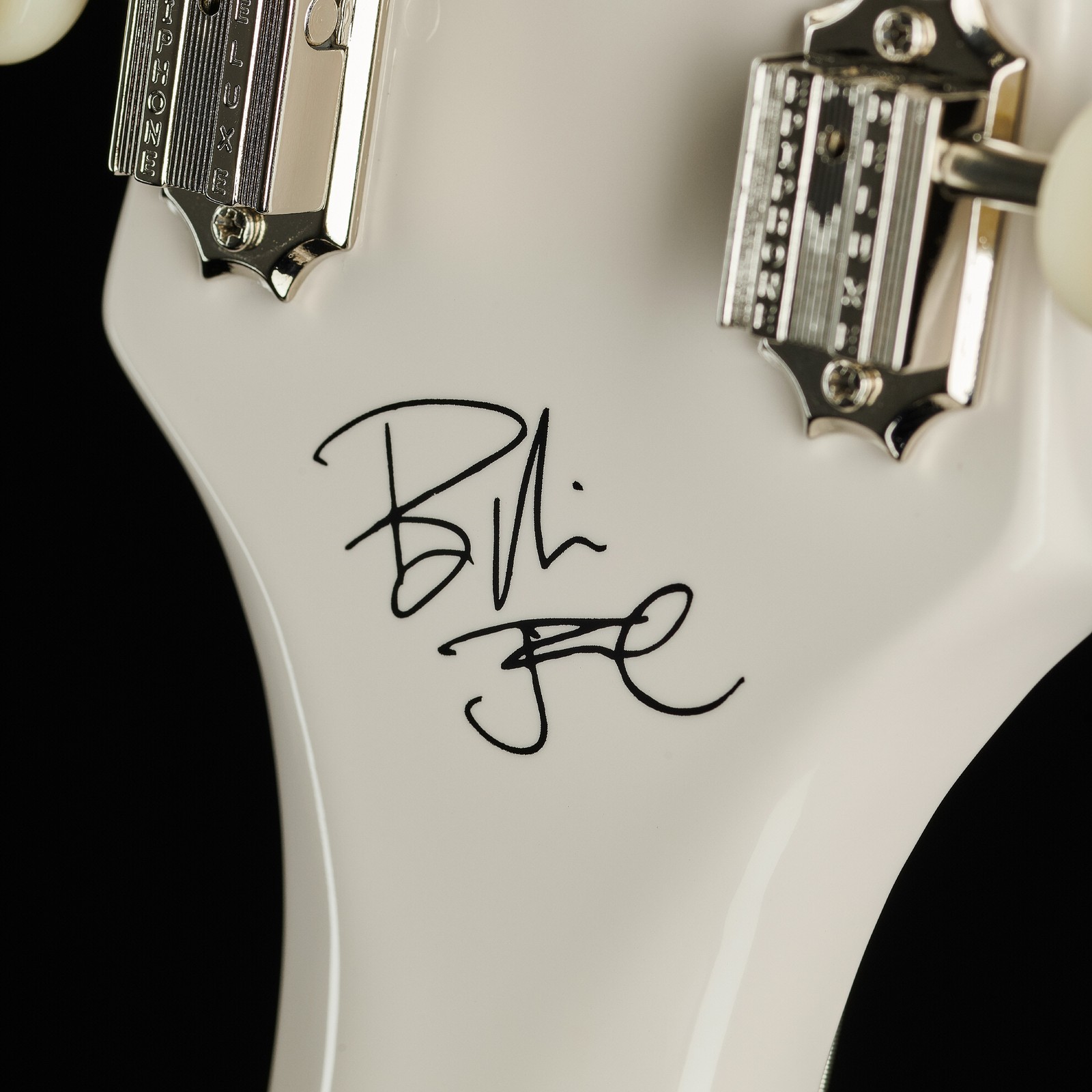 Billie Joe Armstrong Signatur auf der Rückseite einer Gitarren Kopfplatte