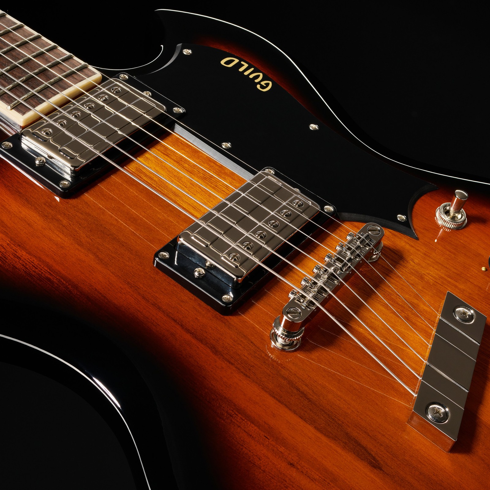 Guild Polara Deluxe Vintage Sunburst Mahagoni Korpus und Humbucker Tonabnehmer