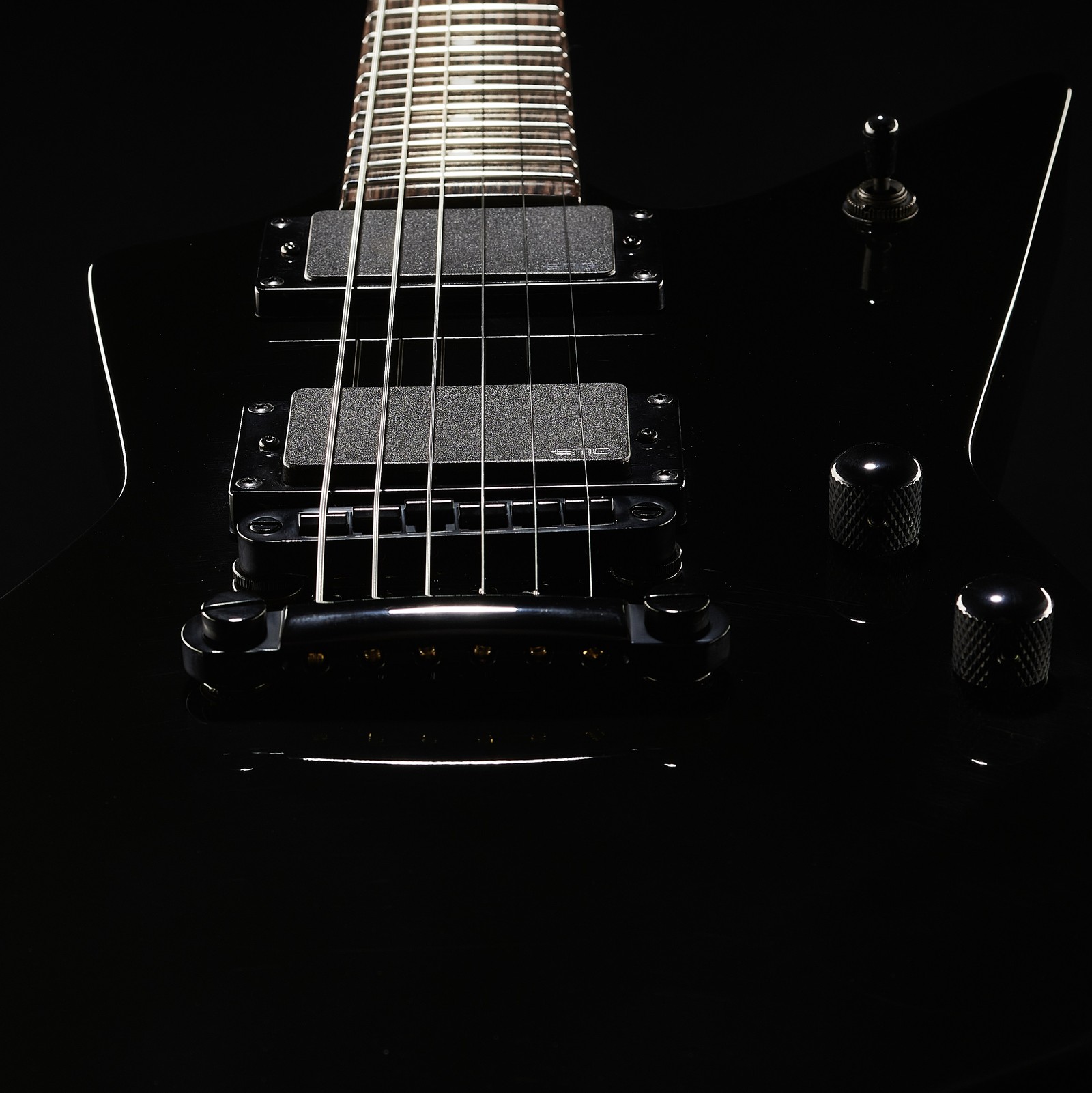 Bridge and Pickups on the Harley Benton EX-84 Modern EMG BK Electric Guitar in black