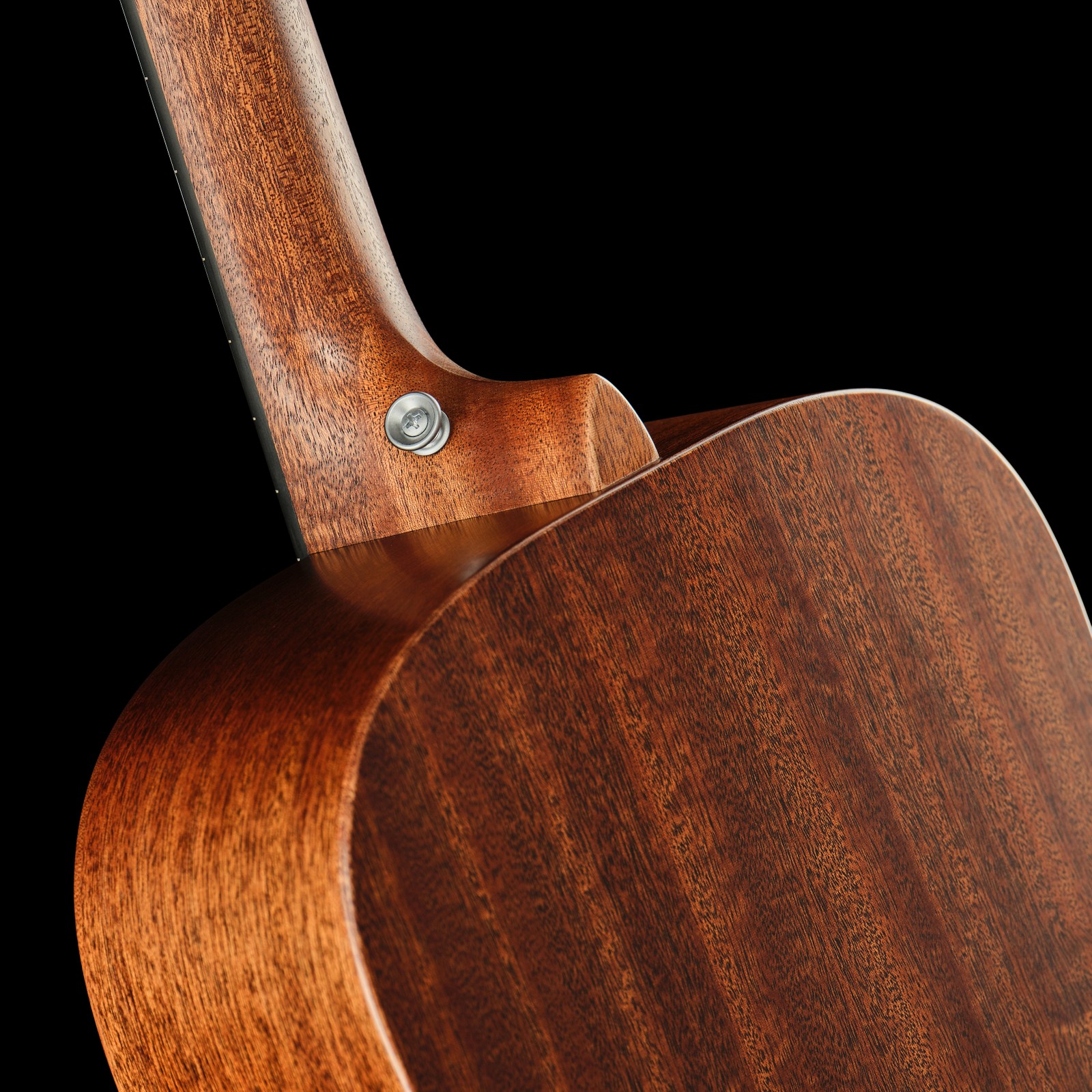 Neck joint of the Martin Guitar D Jr E StreetMaster acoustic guitar