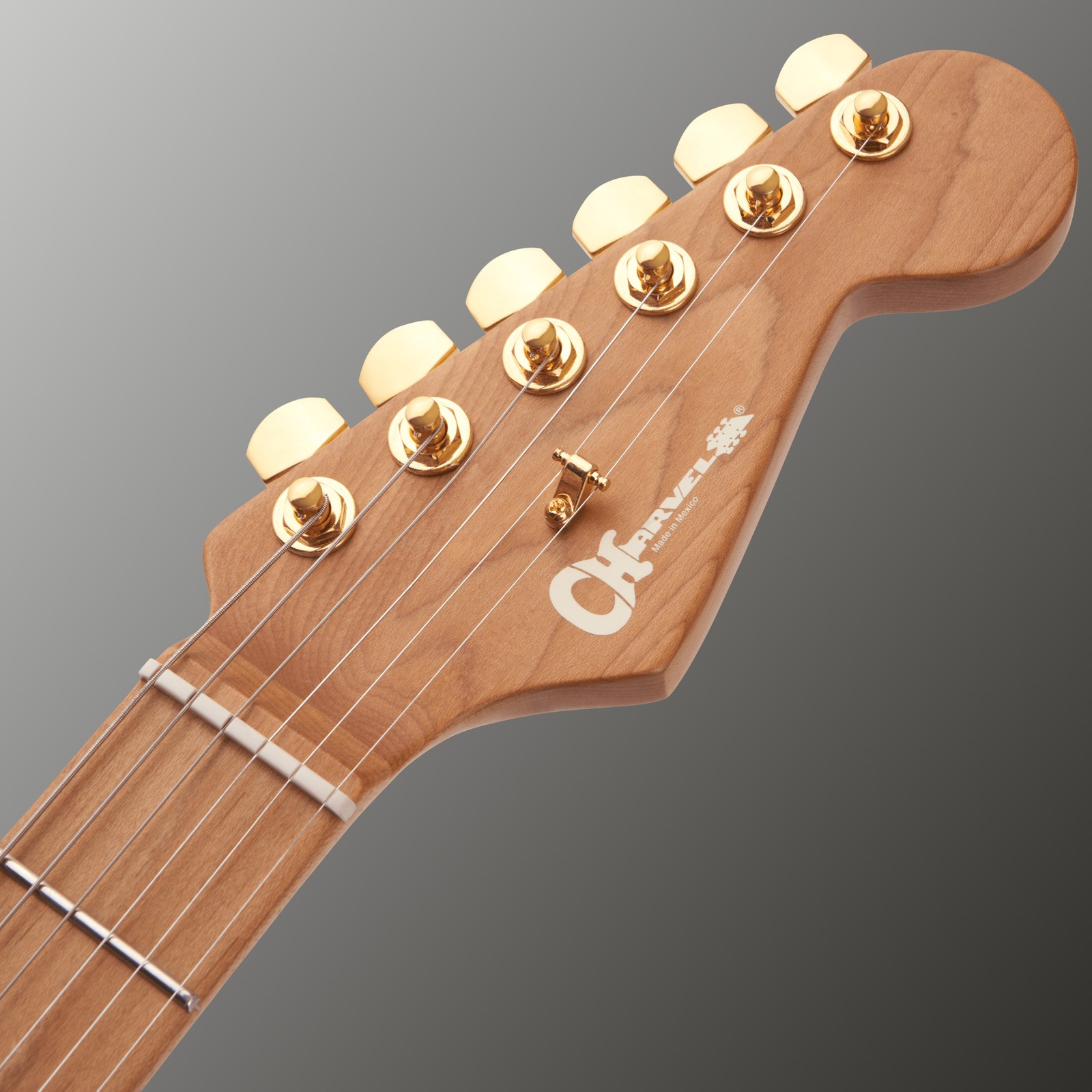 Charvel E-Gitarren Kopfplatte mit vergoldeten Mechaniken