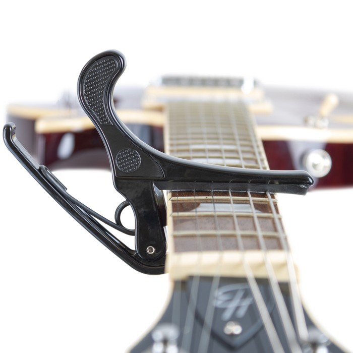 Fits curved fingerboards