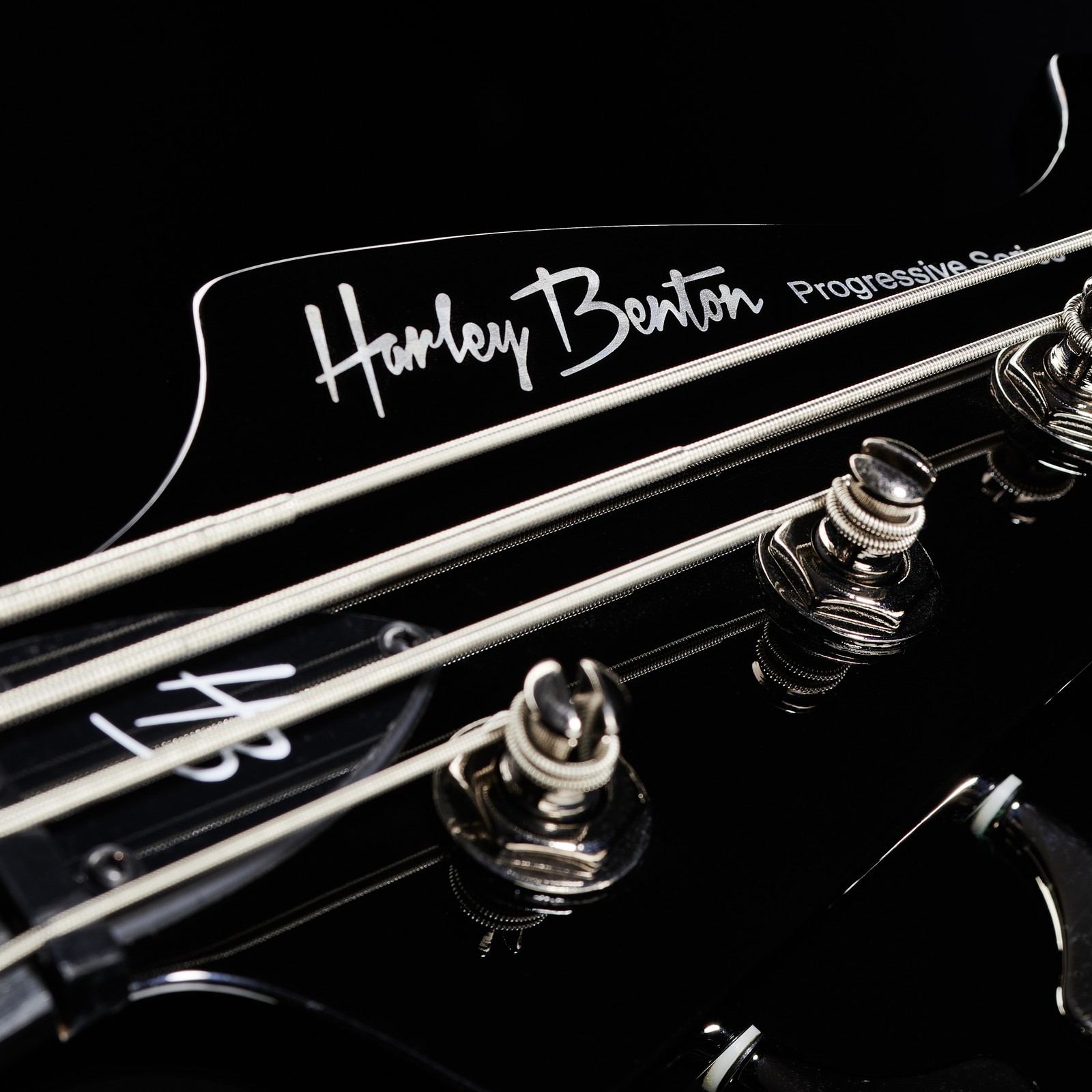 reversed headstock of a Harley Benton bass guitar