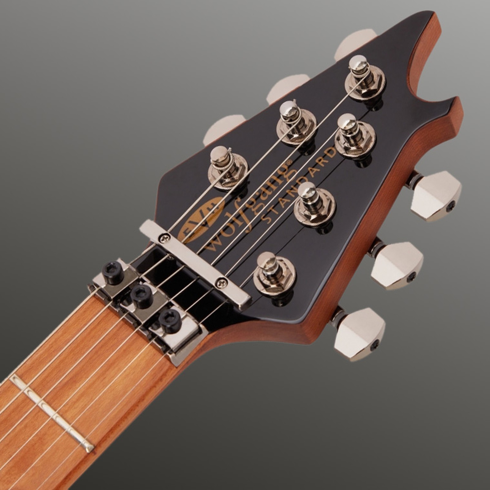 Kleine E-Gitarren Kopfplatte mit EvH Logo und Floyd Rose Klemmsattel