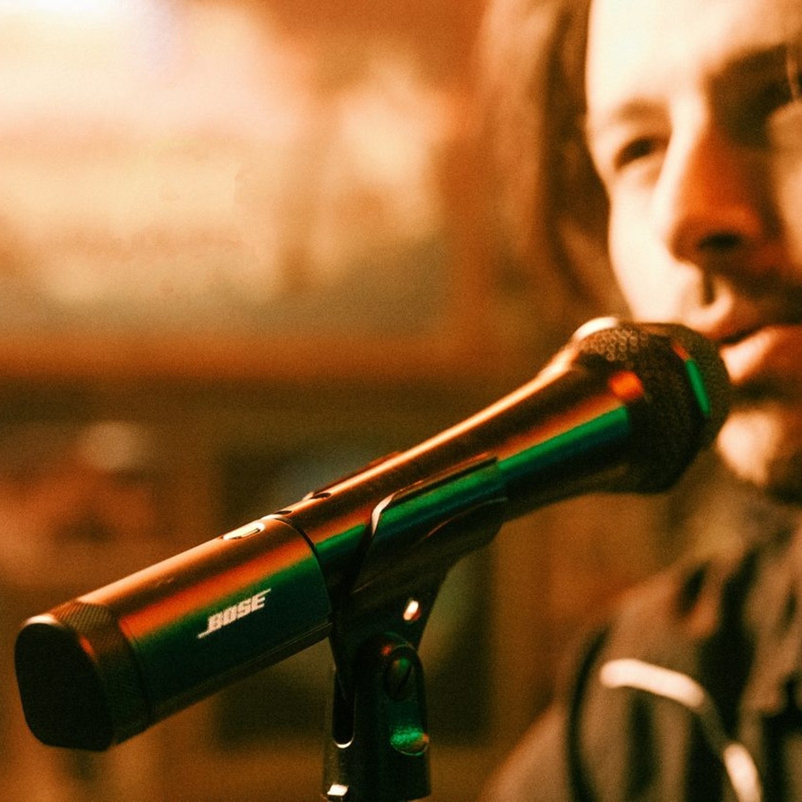 Bose S1 Pro Plus Mic/Line TX, attached to microphone