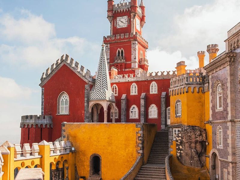 A bright red and yellow building resembling a castle