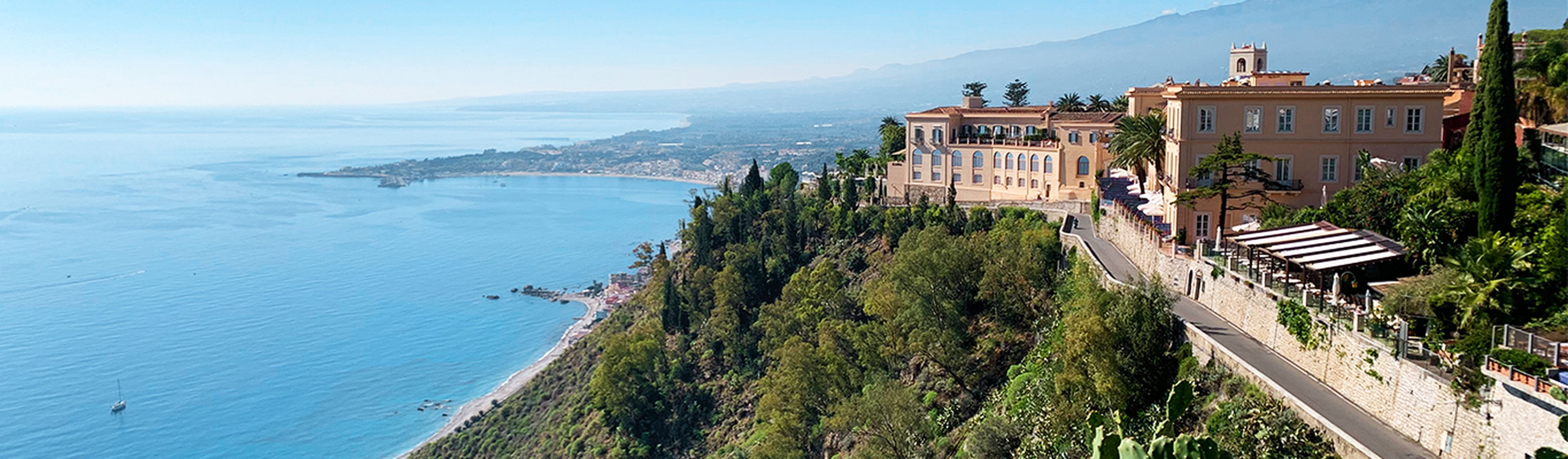 cliff side views of taormina in italy