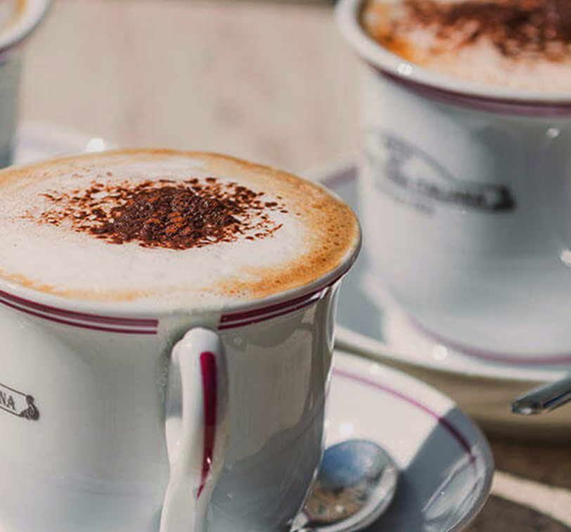 Three cups of coffee on a table