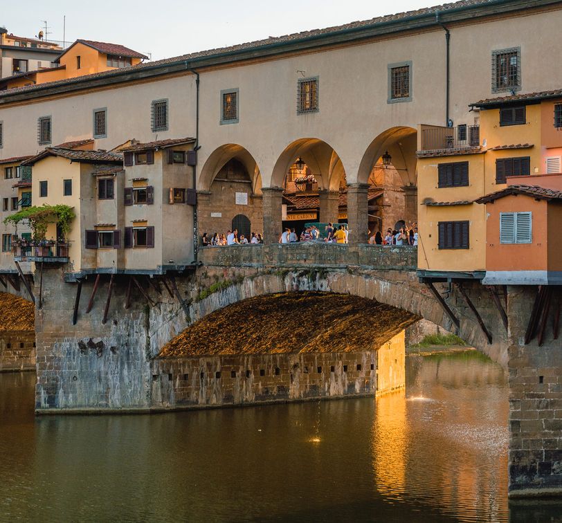 Angular view of Ponte Vecchio in Florence Italy at sunset