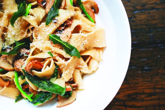 a place of fresh pasta on a white dish