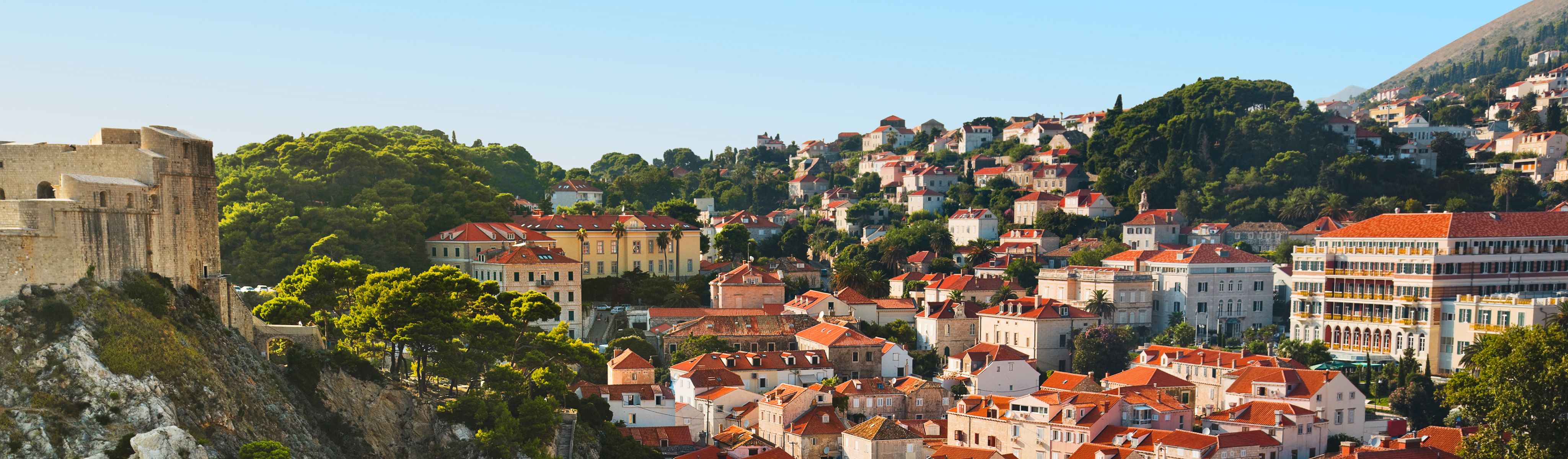 buildings in dubrovnik on the hill with orange roof tops