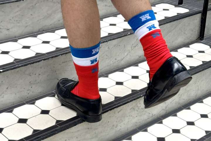 A person wearing layered solid Happy Socks, for our Back to Work collection. 