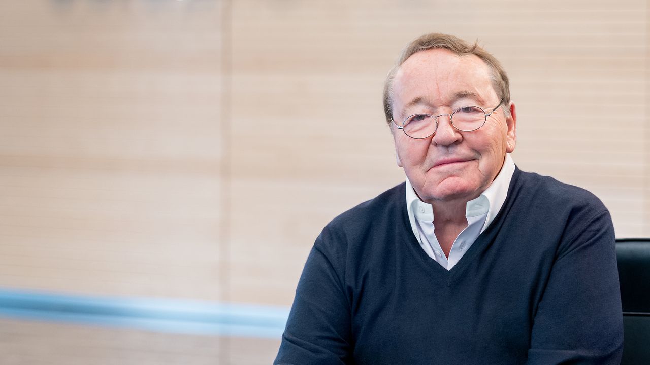 Portrait of Wolfgang Marguerre, Chairman and Chief Executive Officer of the Octapharma Group, seated and smiling in a professional setting.