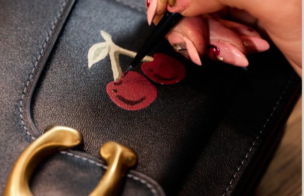 Coach QVB: In-store Customisations with Lu