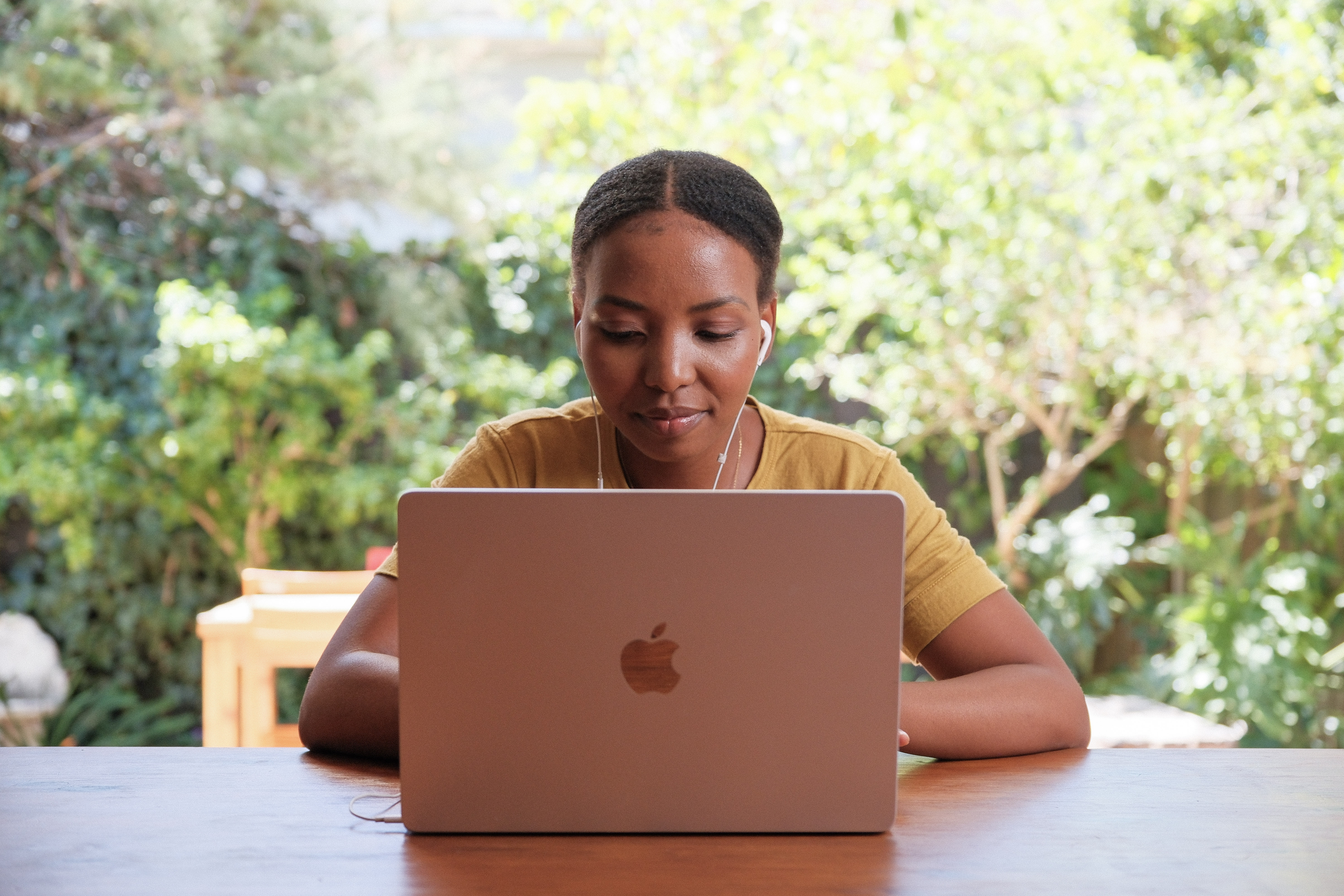A tutor working on her laptop.