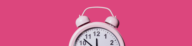 Pink alarm clock against a bright pink background, symbolising regulatory deadlines, timelines and compliance milestones discussed in Biocidal Product Regulation (BPR) Series Part 7
