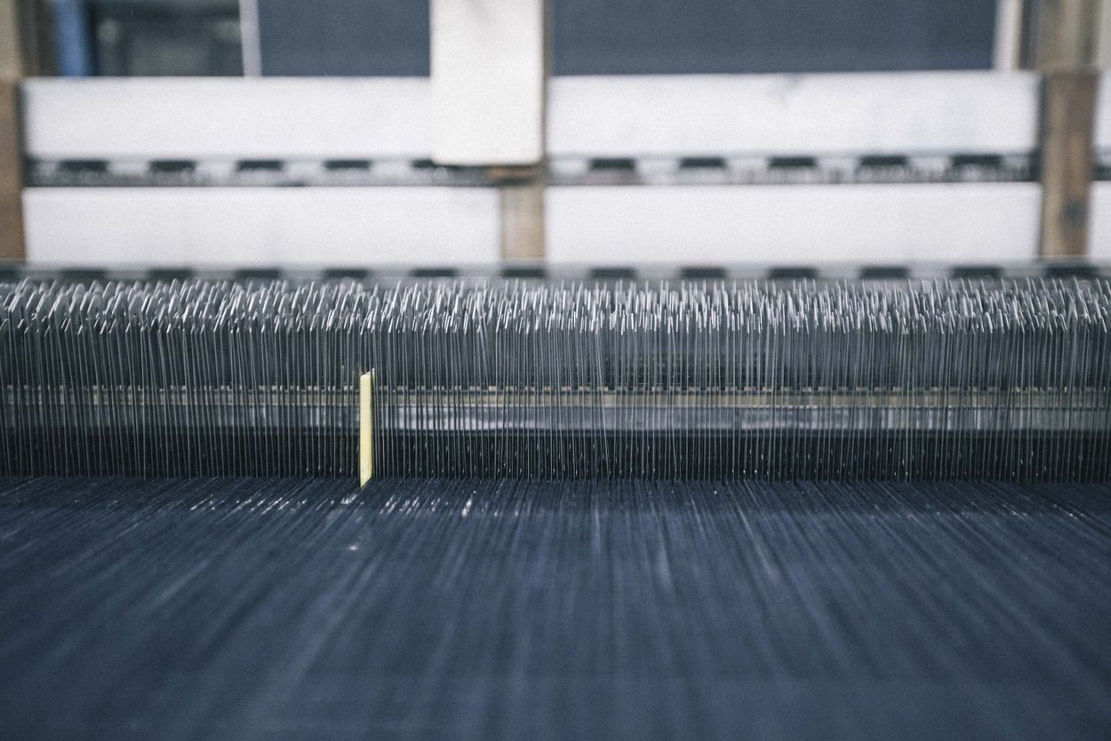 Weaving of denim material machine