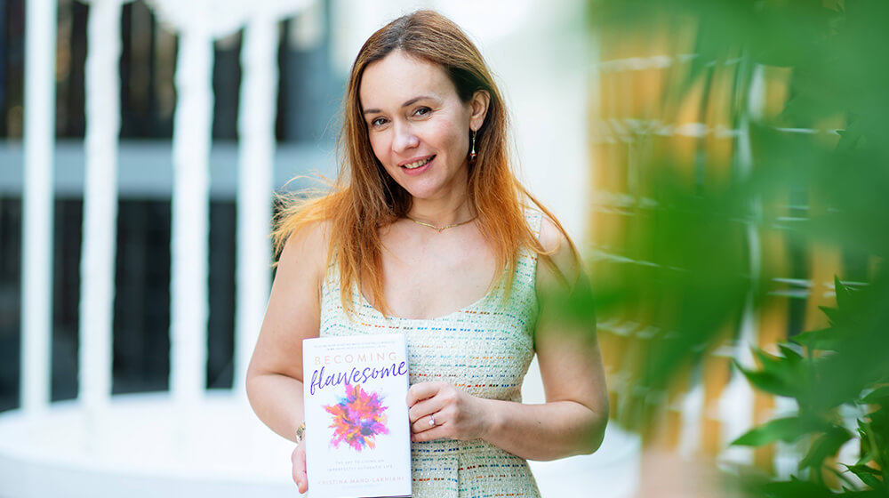 Kristina is the author of Becoming Flawesome