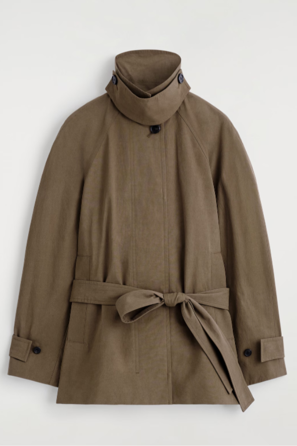 The womenswear team reframe the classic trench for transitional styling. Crafted from lightweight cotton, this piece is designed with a throat latch so that you can experiment with the shape – opt for a funnel neck or classic collar. It's finished with timeless details such as the storm flap and tonal belt. 