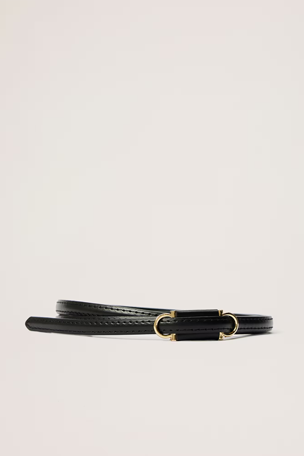 The detail that defines a look. The Elena Leather Belt is crafted in 100% leather with a polished gold metal buckle - a refined, enduring accessory that works equally well cinching a blazer, a trench or a fluid dress for an elevated, considered finish.