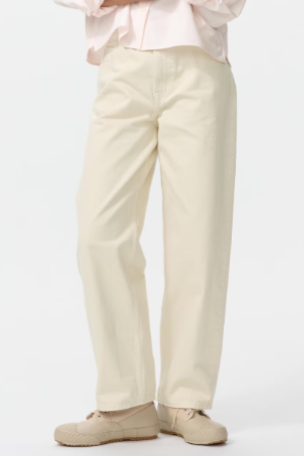 UNIQLO and JW ANDERSON Baggy Leg Jeans. Baggy silhouette is fitted at the waist, flares slightly from the hips, and tapers gently toward the hem. 