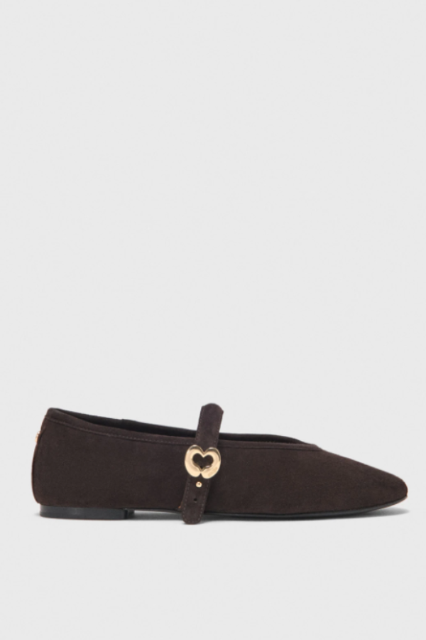 hese ballet flats add a spontaneous, preppy touch to your look, blending a collegiate feel with confident femininity.  Made from dark brown suede leather, they feature a supple design with a rounded toe. The strap fastens with a press-stud and is embellished with a gold Maje Heart buckle, finished with a signature detail on the heel.