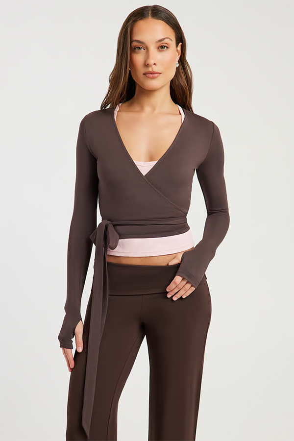 Effortlessly elegant, the Stylerunner Ballet Wrap Top is crafted from a soft, lightweight modal blend that drapes beautifully with a smooth, fluid feel. The wrap-front silhouette features an adjustable self-tie fastening and a deep V-neckline for a feminine finish.