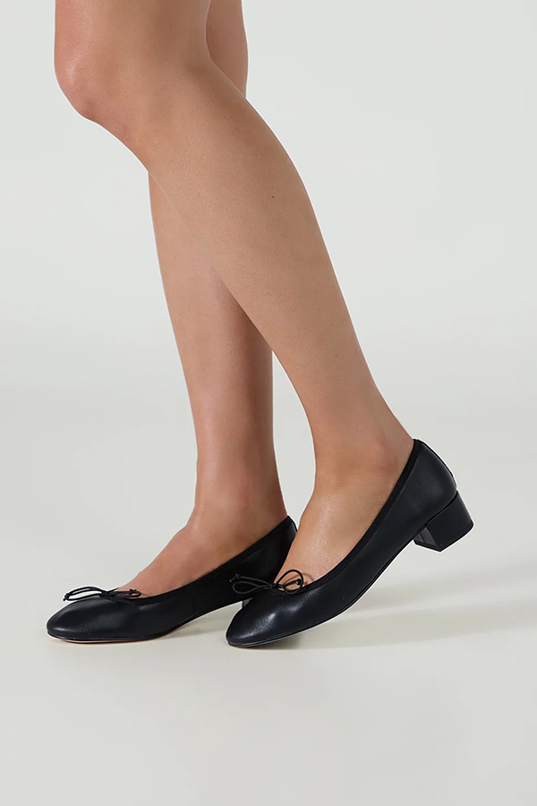 Meet Maddi, the ultimate cool-girl ballet flat. This sleek slip-on style features a subtle block heel for all-day comfort. Crafted from premium leather with an elastic bow detail, Maddi is the perfect everyday flat and an essential low-heel style for effortless, modern dressing.