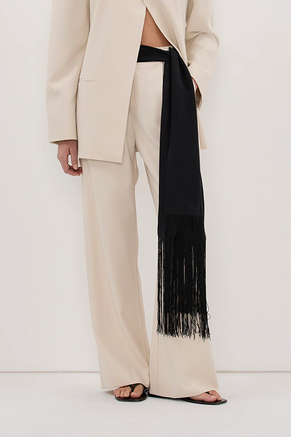 The pant the whole Trinity family depends on. High rise, clean tailored extended waistband and angled front pockets in bone. The matching blazer is technically optional, but we have opinions.