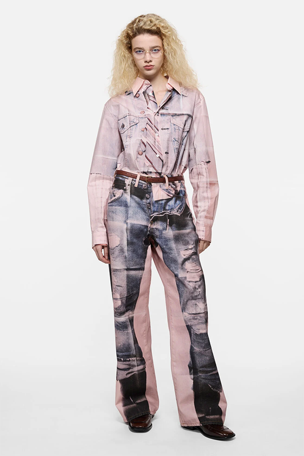 Jeans crafted from ready-to-dye cotton canvas with a brushed face and a seasonal trompe-l’œil print of distressed jeans. 1981 jeans are cut to a loose fit with a low to mid waist and a wide, baggy leg.