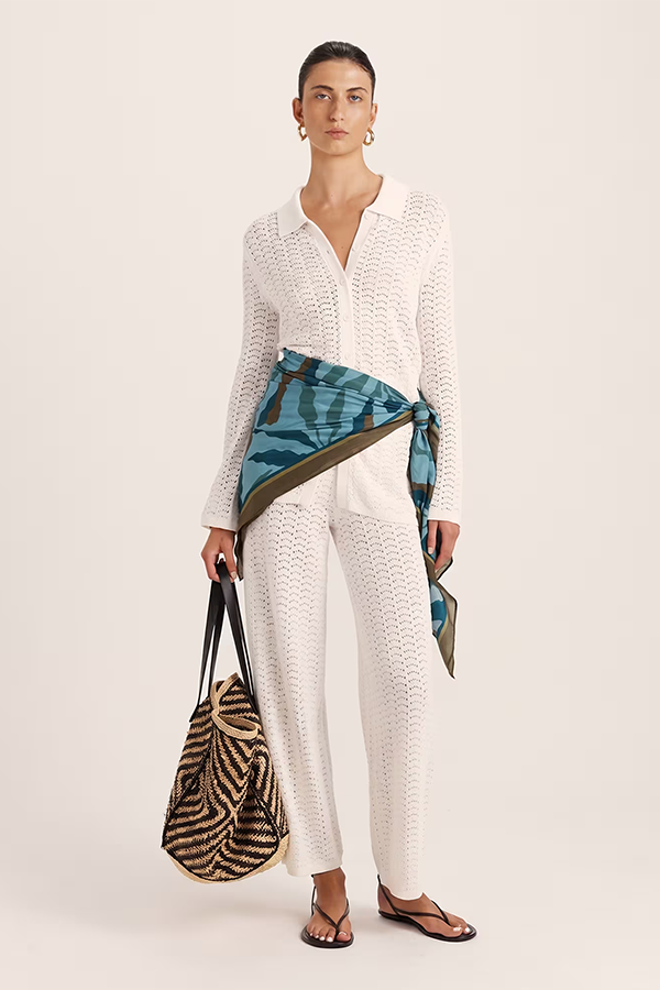 Saba sarong worn over white outfit