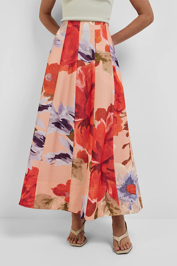 Made for brighter days - Introducing the Kenza Skirt. Featuring a fit and flare full-length silhouette, high-rise waist, panel detailing, placement floral print, concealed side pockets, and a deep flared hemline. 