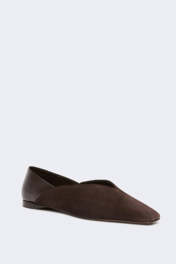 These versatile ballet flats are crafted in calfskin suede with a square toe and a collapsible back that can be worn as a sabot. Designed with a low-sheen nappa leather heel and soft lambskin lining, they feature a wrap-over neckline with hand-stitched detailing. A pumice leather sole is finished with a non-slip Monogram detail, while the 1 cm heel offers subtle lift and everyday comfort.